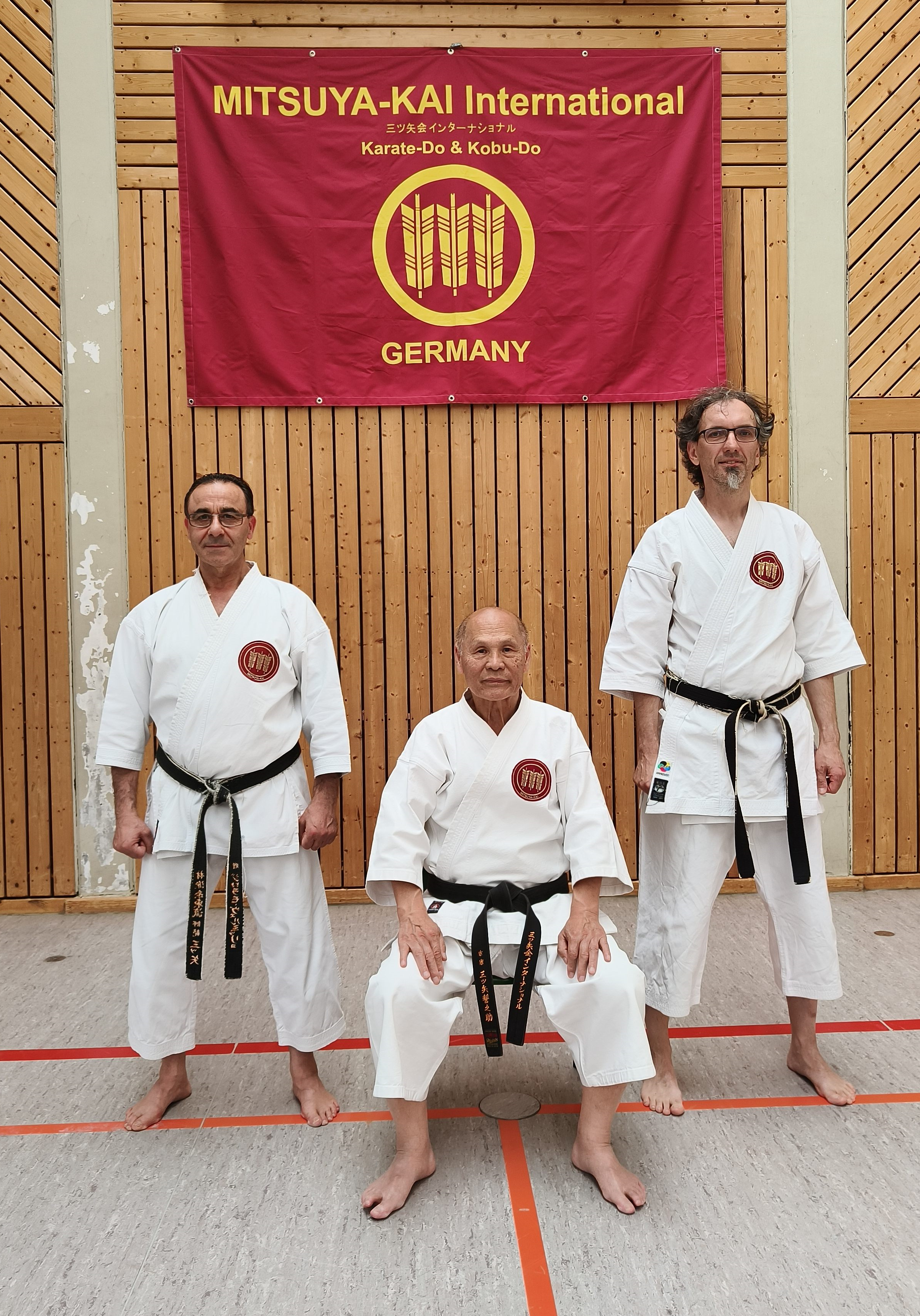 Christian Manz (rechts) zusammen mit Sensei Mimmo und Soke Mitsuya im Frühjahr 2025